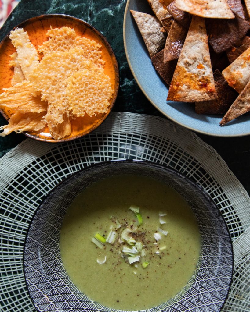 Broccoli soup with Grated cheese crisps and flatbread chips
