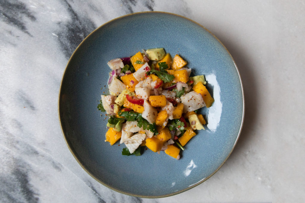 Ceviche with mango and koriander