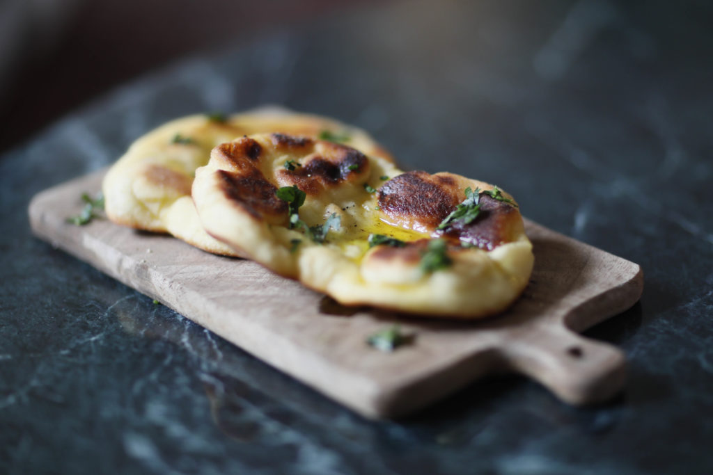 Middle Eastern Homemade Flatbread on a wooden board